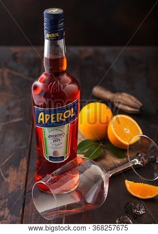 London, Uk - May 20, 2020: Bottle Of Aperol Aperitivo Summer Cocktail Drink With Empty Glass And Ora