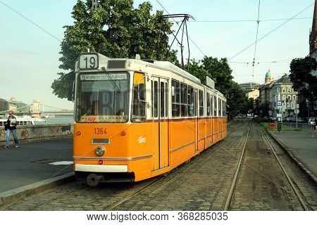 Budapest, Hungary - June 13, 2008: Budapest Tram, Or Called Villamos, Ganz Csmg, On A Stop In Buda D
