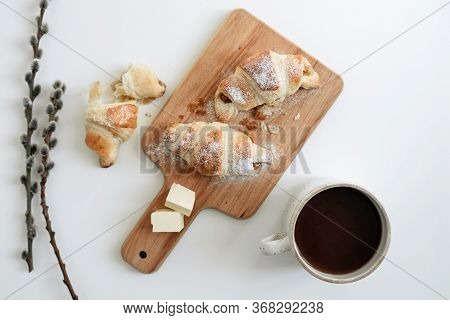 Homemade Puff On Wooden Plate, Cup Of Hot Chocolate And Sprig Of Willow