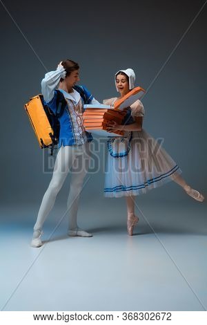 Modern Cinderella And Prince Hurrying Up, Deliverying Pizza. Young And Graceful Ballet Dancers Durin