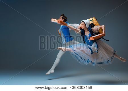 Modern Cinderella And Prince Hurrying Up, Deliverying Pizza. Young And Graceful Ballet Dancers On St
