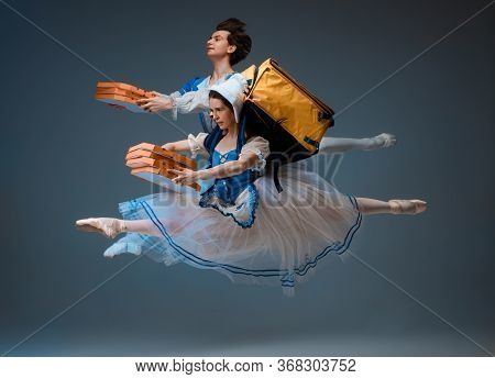 Modern Cinderella And Prince Hurrying Up, Deliverying Pizza. Young And Graceful Ballet Dancers On St