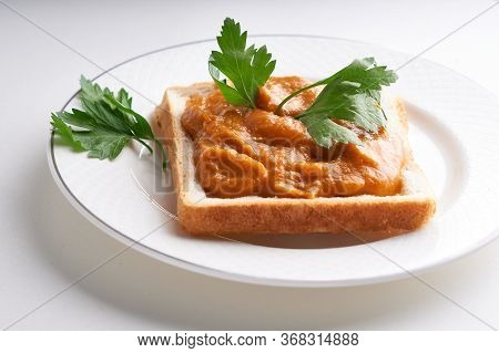Healthy Toast With Zucchini Caviar. Russian Traditional Sandwich Served In A Plate With Herbs On A W