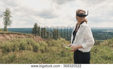 Girl Puts On Black Fpv Goggles To Control The Drone