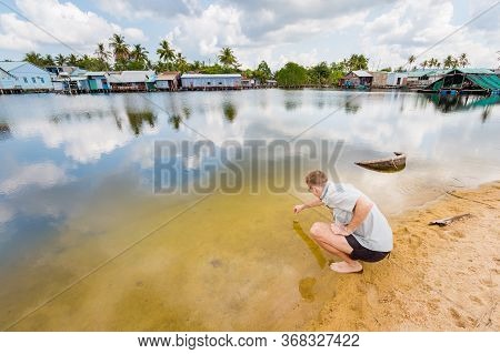 Tourist In Local Village Cua Can Vietnam