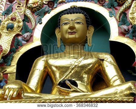 Closeup Of The Buddha Statue At Namdroling Buddhist Monastery In Karnataka, India