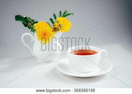 Morning Tea With Bouquet Of Yellow Spring Dandelion Flowers. Beautifully Styled Feminime Elegant Whi