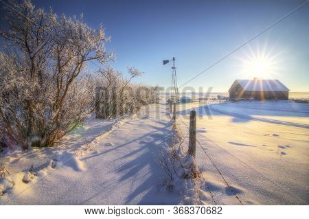 An Abandoned Heritage Farm Home On The Open Prairies Of Alberta Canada In Rockyview County In Winter