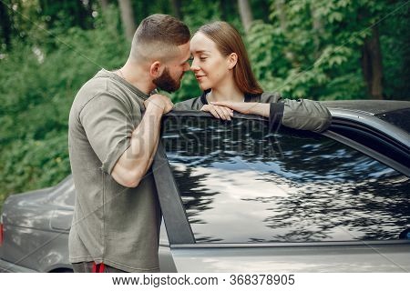 Beautiful Couple Spend Time On A Summer Forest
