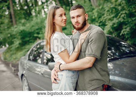 Beautiful Couple Spend Time On A Summer Forest