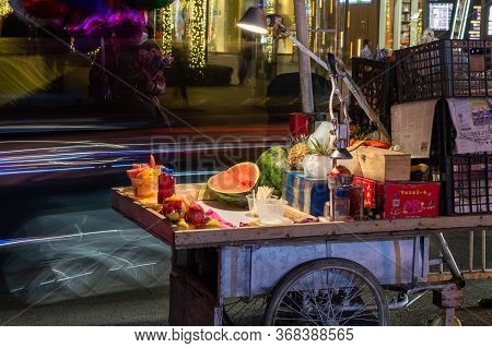 Beijing, China - July 12, 2016: Fruit Stall On A Bicycle Cart In Sanlitun Area, Chaoyang District In