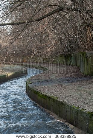 Urban Stream In Winter. The Lybid River In Kyiv (ukraine).