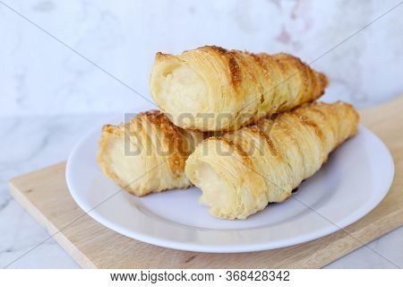 Horn Pastry Cake With Vla Or Vanilla Custard Filling. Homemade Cumcum Cake Filled With Cream
