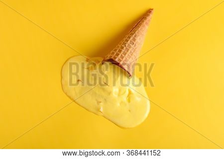 Top View Durian Flaor Ice Cone Melted On A Yellow Background