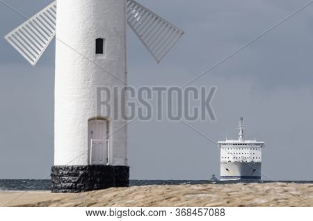 Passenger Ferry And Navigation Sign Stawa Mills - A Ship On The Horizon Sailing To The Seaport