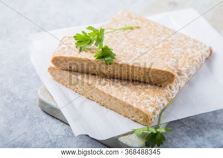 Slice Of Tempeh On Table, Tempeh Is Traditional Food From Indonesia.