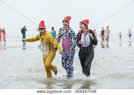 Scheveningen Annual New Year’s Dive And Swim. Typical Dutch Tradition