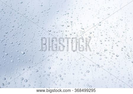 Large Raindrops On Glass On An Autumn Day, Inclement Weather, Selective Focus