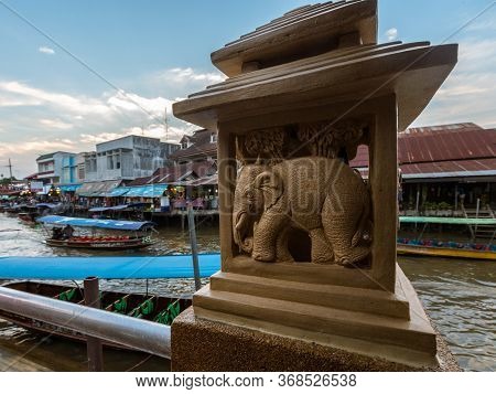 Small Royal Thai Elephant Statue With Sunset Sky In Background