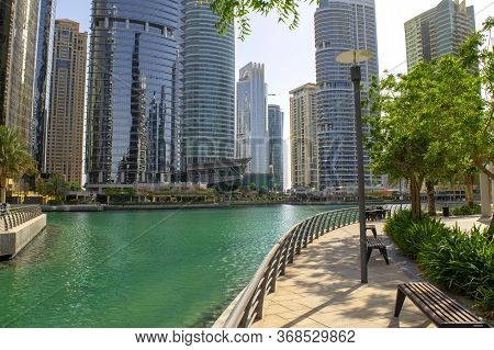 Dubai / Uae - May 26, 2020: View Of Jumeirah Lakes Towers Skyscrapers With Artificial Lake. Beautifu