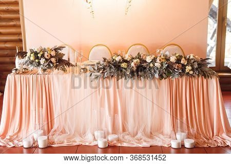 The Presidium With Fresh Flowers Of The Newlyweds At The Wedding
