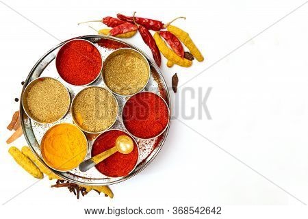 Spices And Dry Herbs Isolated On White Background