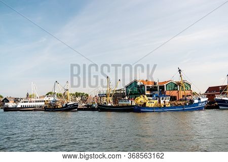 Urk Netherlands May 2020, Fishing Boats In The Harbor Of Urk Preparing For Going Back Fishing After 
