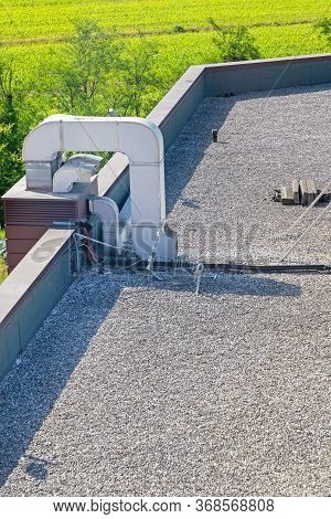 Air Duct Hvac At Gravel Flat Roof Hall Building