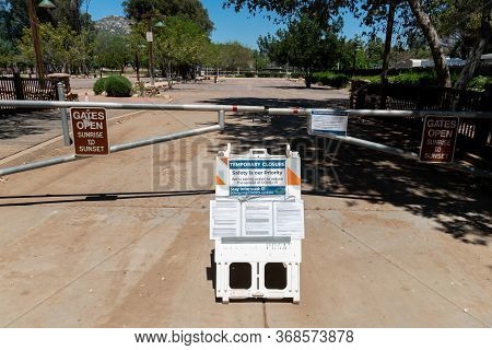 Closed Poway Park With Informative Signage During Covid-19 Pandemic. Closed Area To Prevent The Spre
