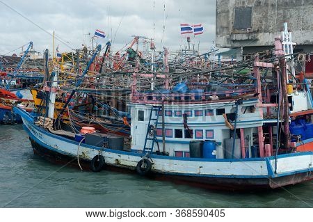 Rayong,thailand-february 8,2013: A Group Of Fishing Boats Moored In The Harbor To Avoid The Monsoon 