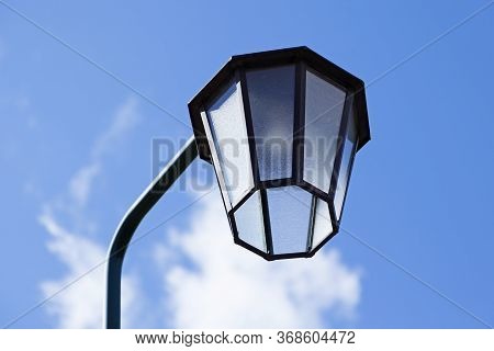 Street Lamp By Cemetery With Summer Sky On Haga