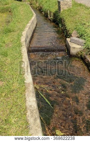 Irrigation Canal Called Subak, A Traditional Way Of Bringing Water To The Fields And Rice Terraces I