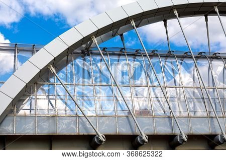 Main Arch Superstructure Beam With Cable Suspended Support. Fragment Of An Aboveground Pedestrian Cr
