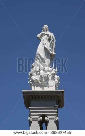 Seville, Spain - July 14, 2011: Monument To The Immaculate Conception In Triunfo Square In The Histo