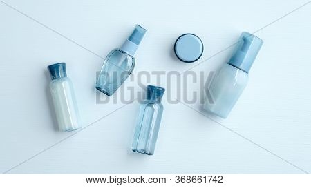 Spa Natural Organic Cosmetic Products Set. Top View Water Based Skincare Beauty Products On Blue Bac