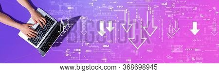Descending Arrows With Woman Using A Laptop Computer