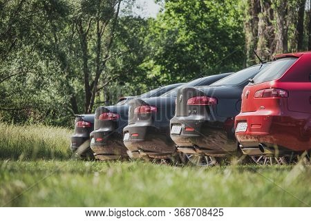 Blato,croatia May 2020
Multiple Alfa Romeo 156s And 159s Lined Up, Parked In Nature. Rear Of Cars Pe