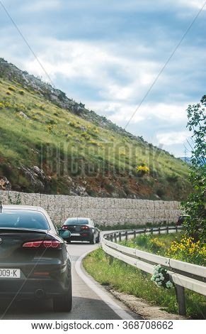 Split,croatia May 2020
Rear Side Of An Alfa Romeo 159 Driving In A Public Road. Enthusiasts Meeting 