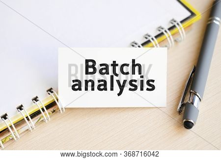 Batch Analysis - Seo Text On A Notebook With A Spring And A Gray Handle