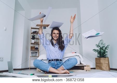 Happy Young Woman Rejoicing After Finishing Task At Home
