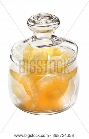 Dried Pineapple Candy Rings, In Powdered Sugar, Close-up Under Sunlight, Lying In A Transparent Glas