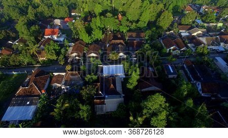 Residential Housing Among The Trees Can Be Seen From Above Using Drones. Forest Outskirts And Urban 