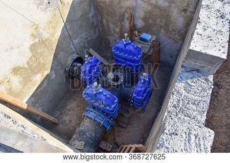 Resilient Seated Gate Valves Connect Pipeline Of Water Supply In Concrete Bunker At Constructin Site