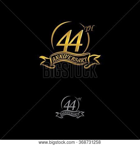 Celebrating The 44th Anniversary Logo, With Gold Rings And Gradation Ribbons Isolated On A Black Bac