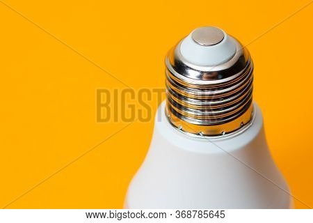 Led, New Technology Light Bulb On Yellow Background, Energy Super Saving Electric Lamp Is Good For E