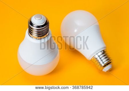 Led, New Technology Light Bulb On Yellow Background, Energy Super Saving Electric Lamp Is Good For E