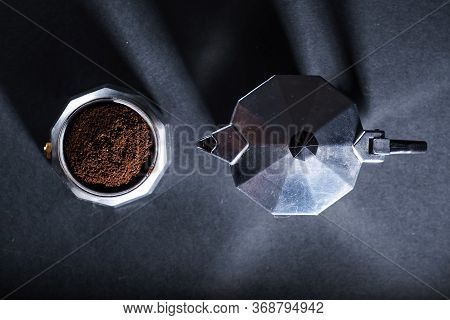 Photo Of Turks With Coffee On A Black Background Top View. Turk Kettle For Coffee. Geyser Coffee Mak