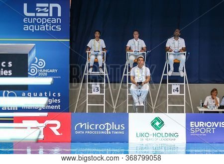 Kyiv, Ukraine - August 9, 2019: Diving Referees In Action During The Mixed 10m Synchro Final Of The 