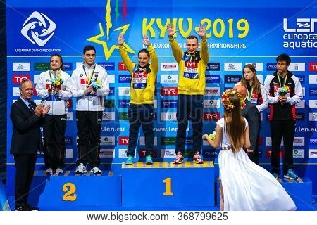 Kyiv, Ukraine - August 6, 2019: Medalists Of Mixed 3m Synchro Final Of The 2019 European Diving Cham