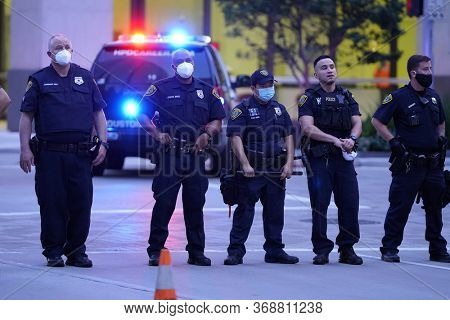 May 29, 2020 - Houston, Texas, USA: Police and spectators collide in downtown Houston, TX as rioters protest the beating and killing of George Floyd by Minneapolis police earlier in the week.
